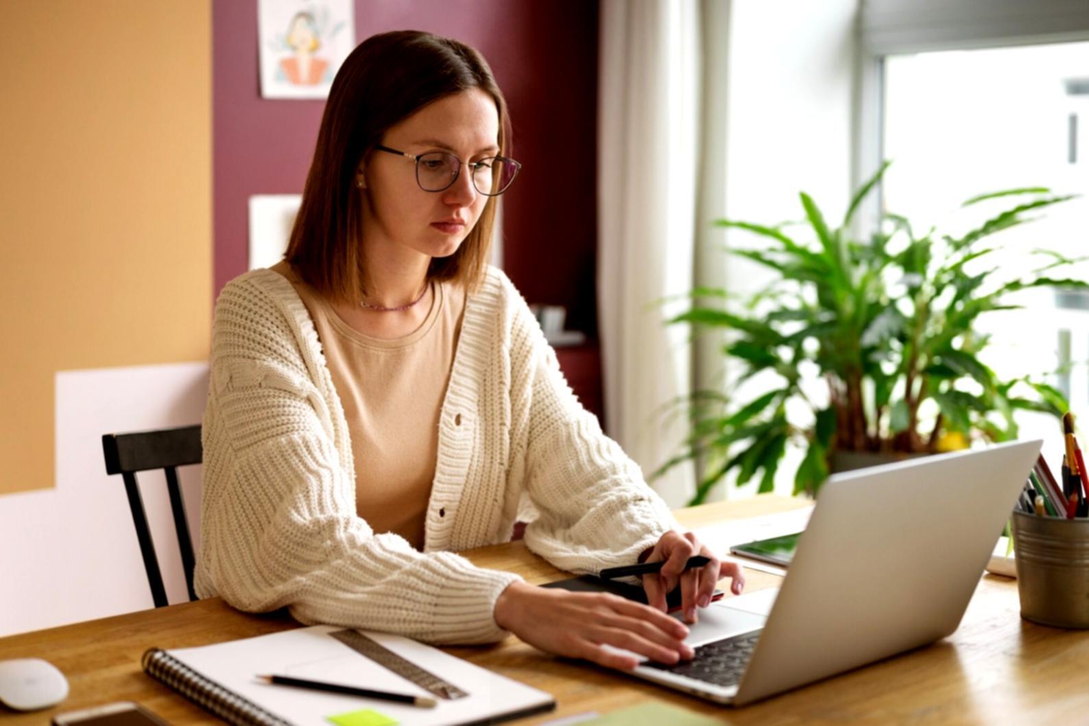 Participant reviewing personal financial documents during hands-on workshop session